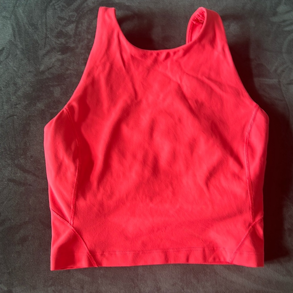 Lululemon built-in bra cropped hot pink top size 2. In perfect condition.